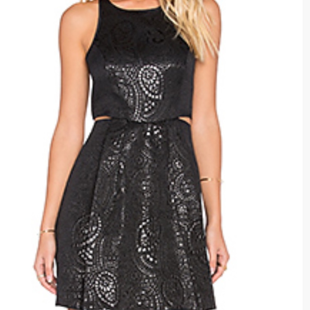 BCBG black dress with cutouts. Size 4.